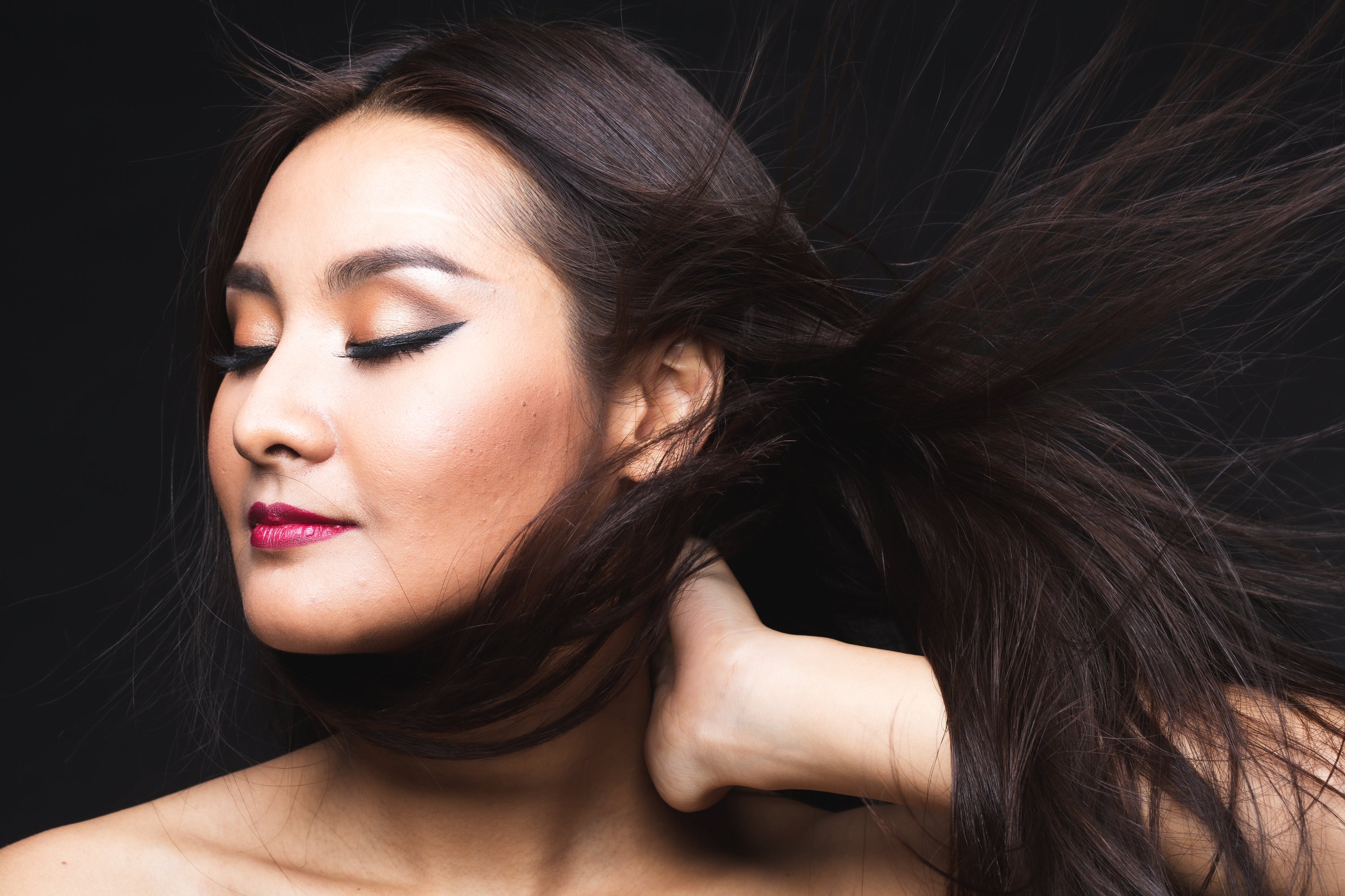 Portrait of young asian women with shiny hair after using Kadura conditioner