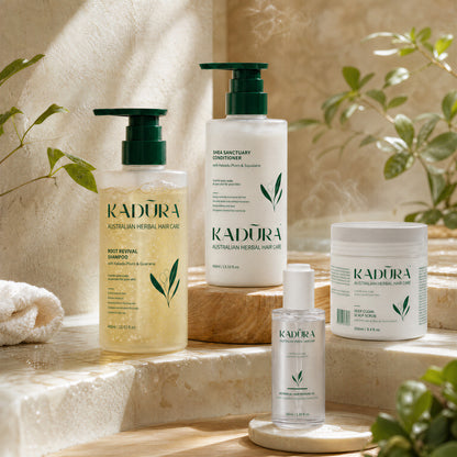 Kadūra Balance &amp; Repair Set for oily scalp and dry ends on bright botanical stone steps