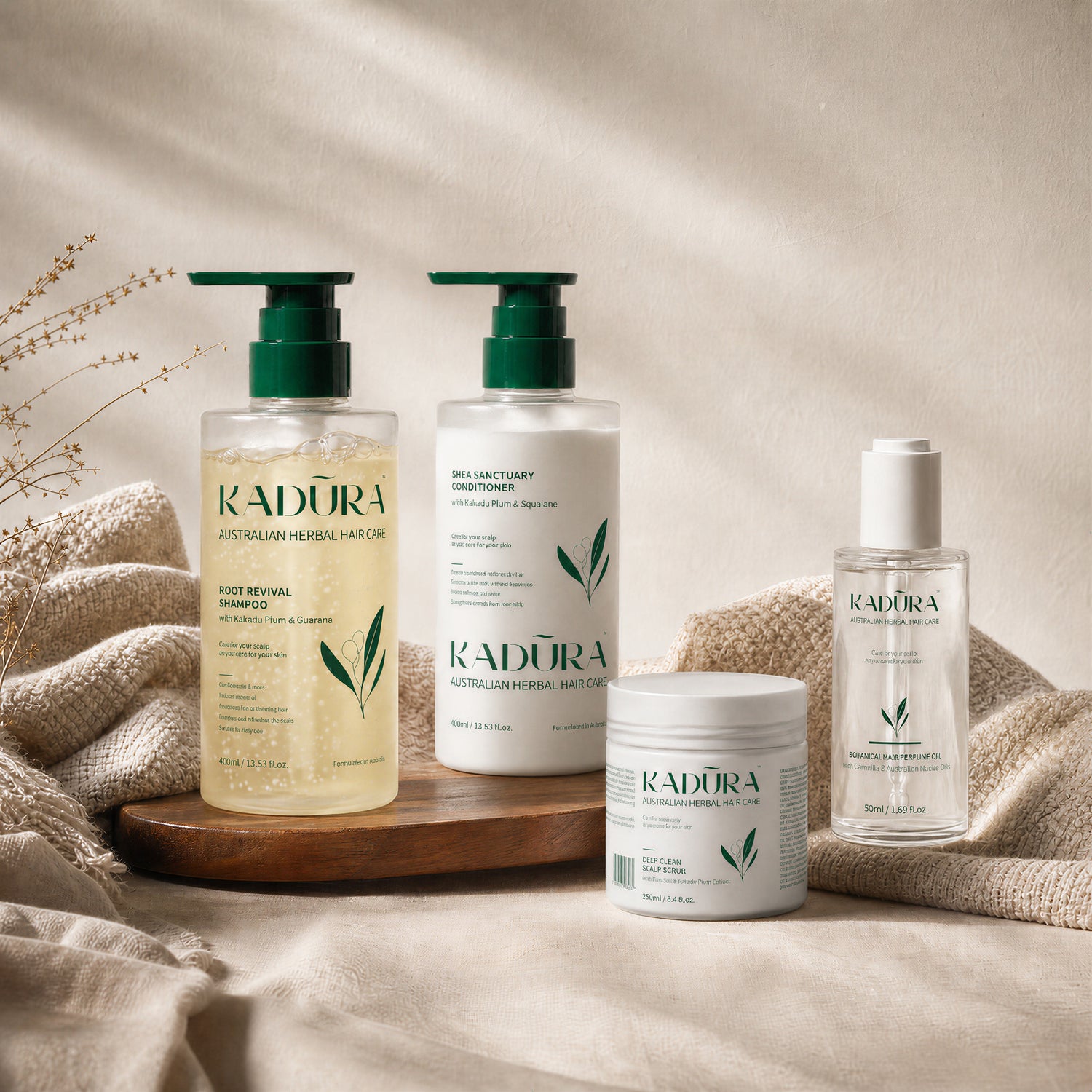 Kadūra Balance &amp; Repair Set for oily scalp and dry ends on a soft neutral linen tray
