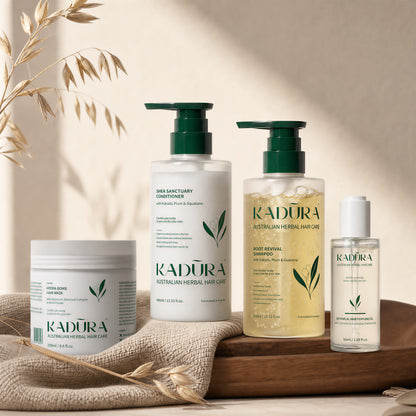 Kadūra RepairLux Set for dry damaged hair repair routine on a warm neutral tray display