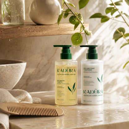 Kadūra SilkFlow shampoo and conditioner duo for frizzy hair in a sunlit bathroom setting